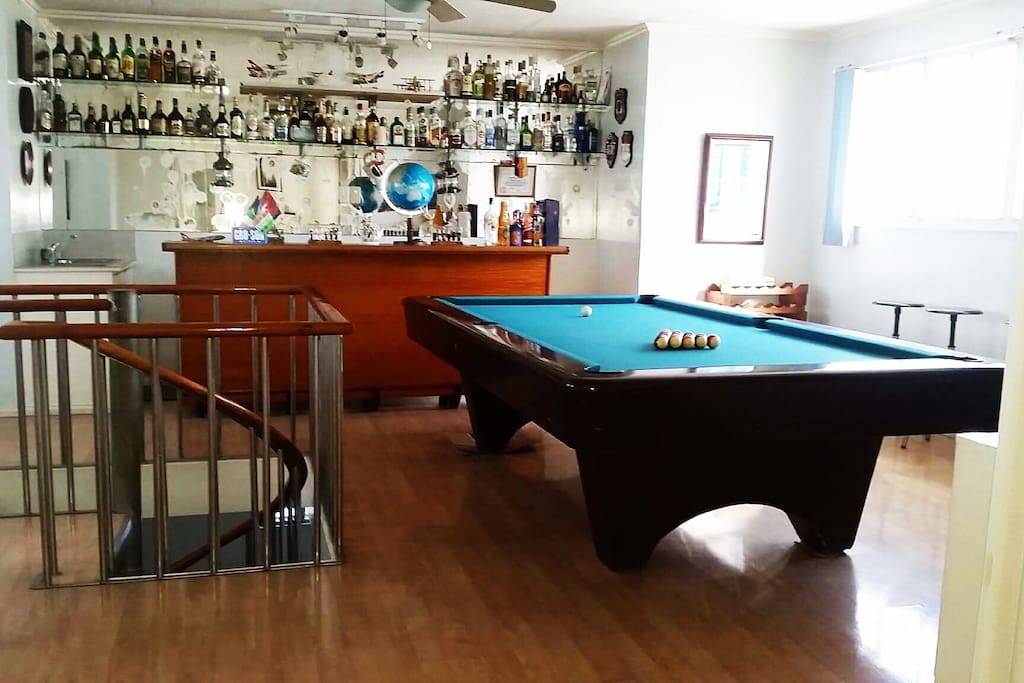 Pool table & Bar. By the stairs. We collect alcohol.