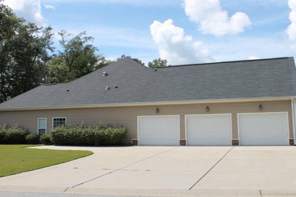 3 car garage space and large parking area