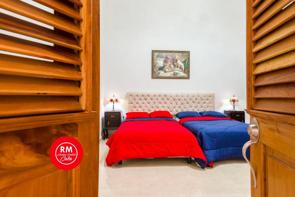 Bedroom 1 with 2 double bed air conditioner and private bathroom