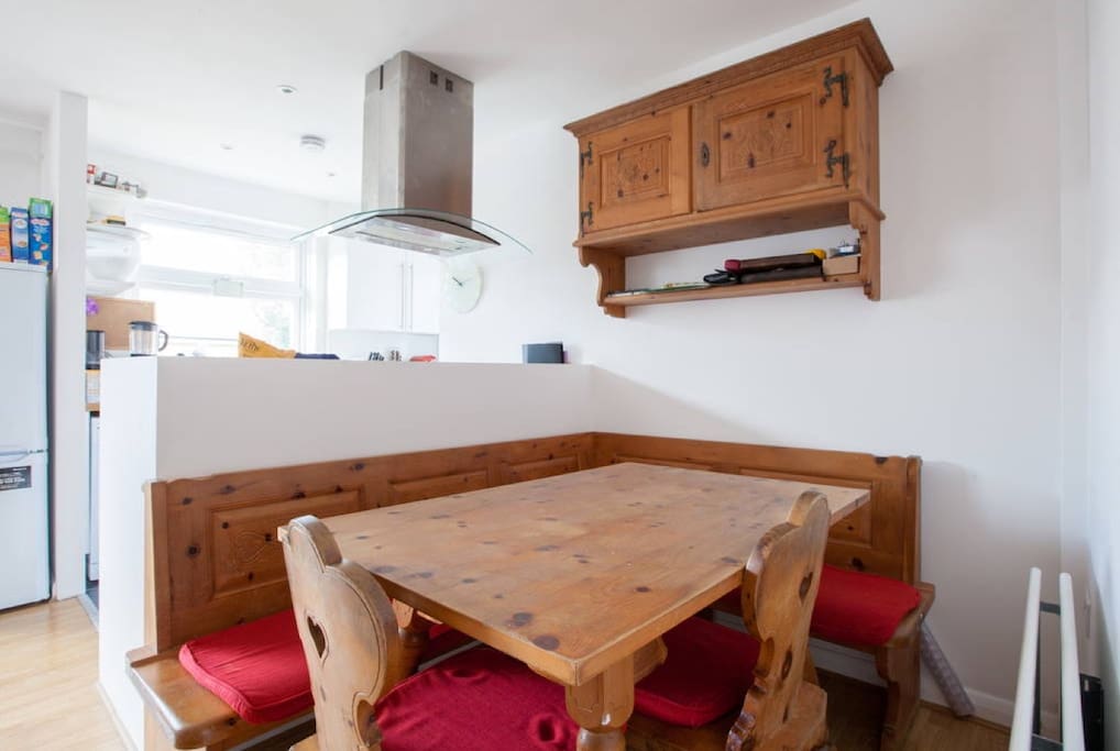 The cosy dining and breakfast area where you can dine with candles or just have a lovely breaky. The table is made out of traditional swiss wooden pine.
