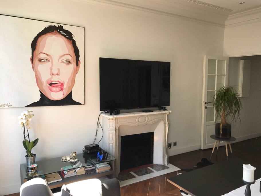 TV and painting of Angelina Jolie