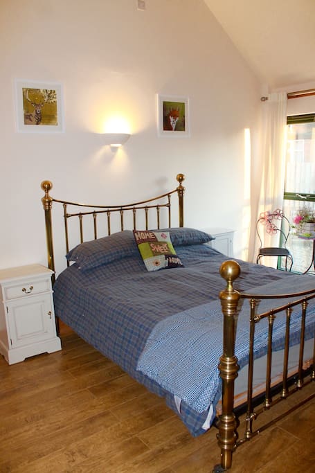 Bed room one with double bed and Ensuite bathroom