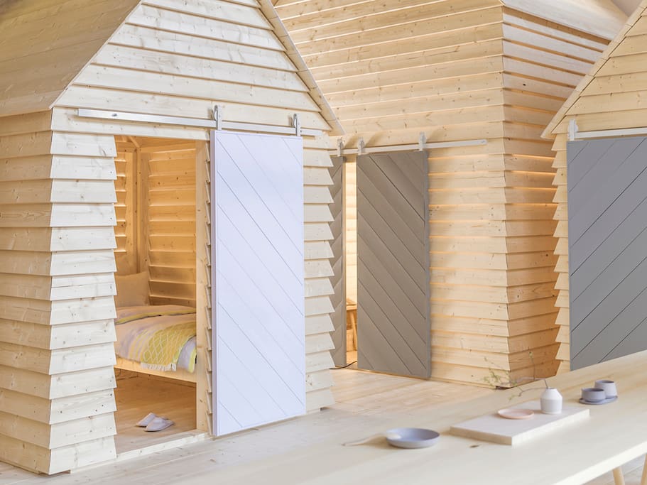 KOTI (Finnish for "home") transforms the premises of Tori Quarters Sofiankatu 4 to bring the magic of the communal cottage experience in the very heart of Helsinki.