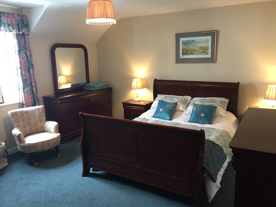 Bedroom 2. King Size bed, wardrobe, chest of drawers, TV, Large Dressing Table with drawers.
