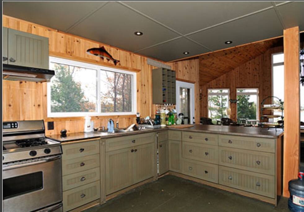 Spacious open concept kitchen looking out over the great room and the beautiful southwest view.