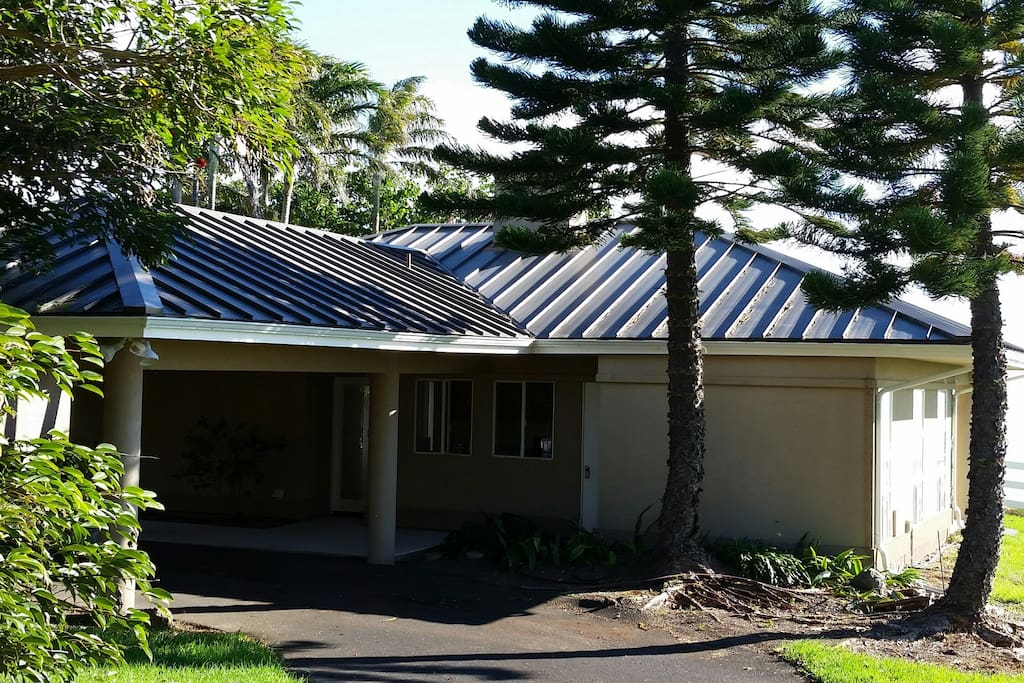 Driveway side of Ohana with covered parking