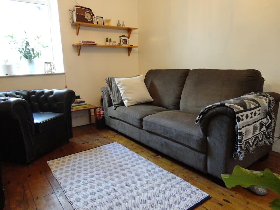 Living Room: Probably the comfiest sofa in Cardiff, lots of space to stretch out and relax after an spending time in the city.