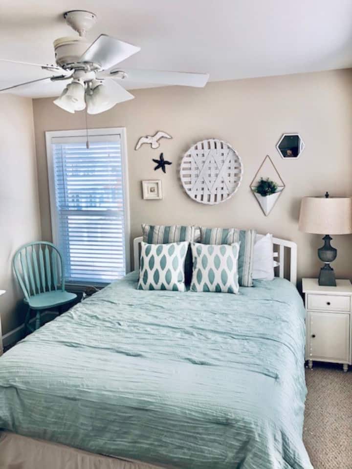 Upstairs bedroom with queen bed.