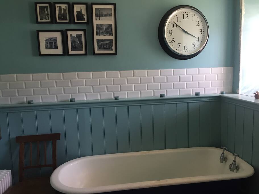 Original cast iron roll top bath