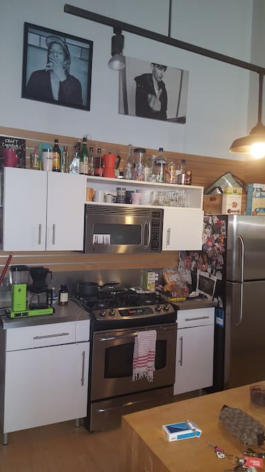 Kitchen with convection oven, dishwasher, coffee maker