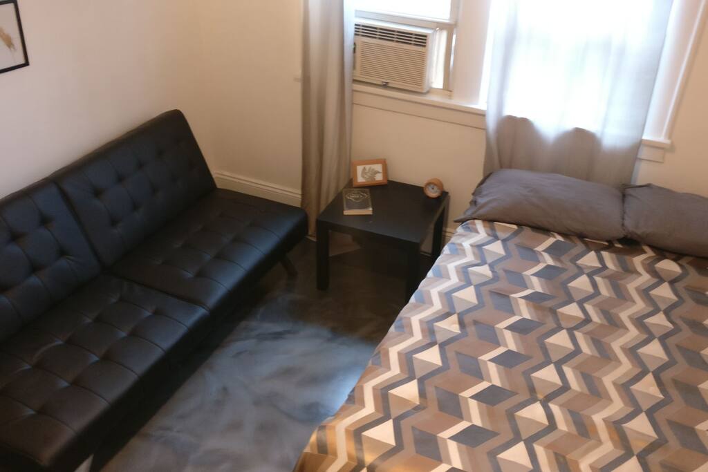 we added this sofa that folds flat and sleeps 2