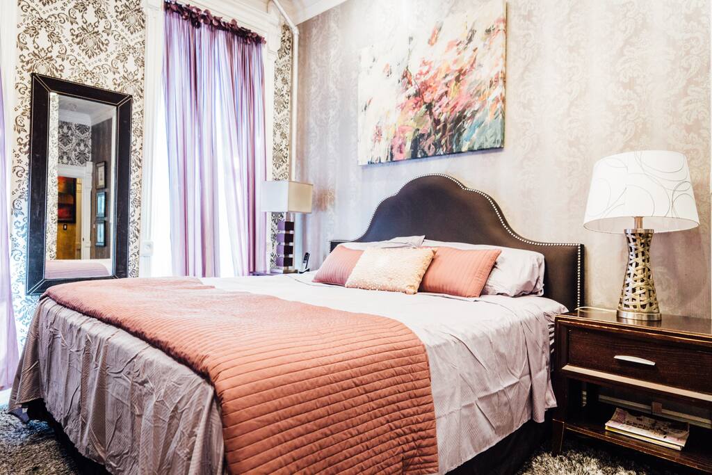 Master bedroom with King sized bed and ensuite bathroom