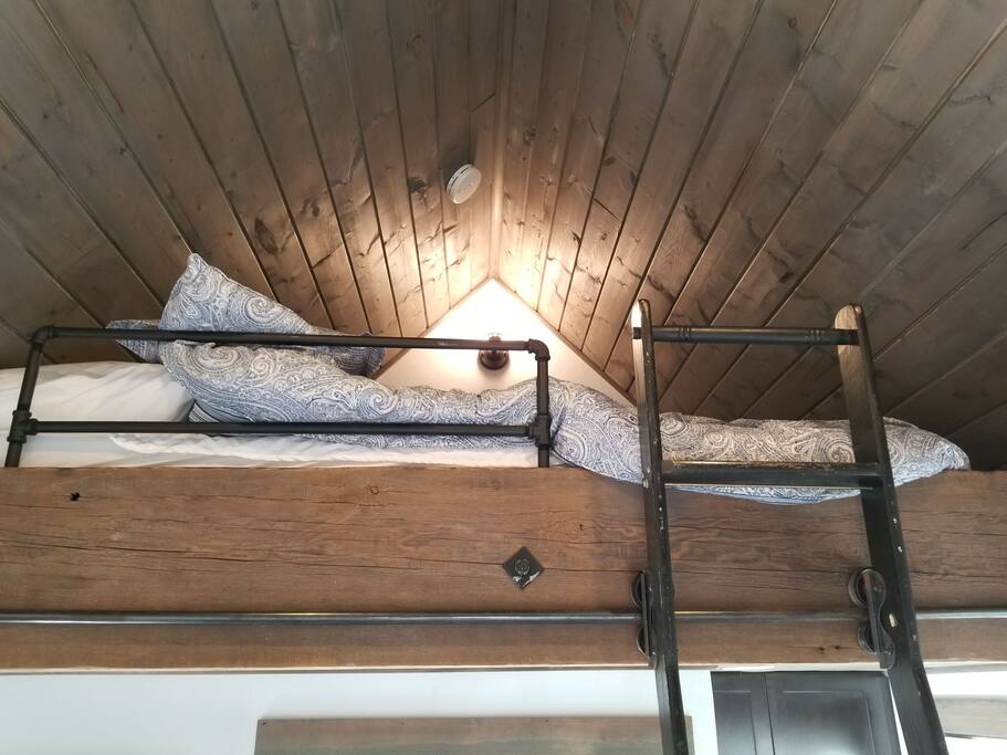 Loft with queen bed, library ladder, must be able to climb ladder.