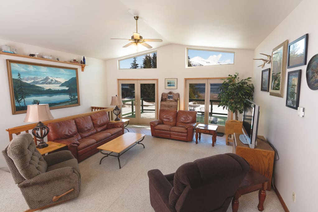 Living room with doors to deck