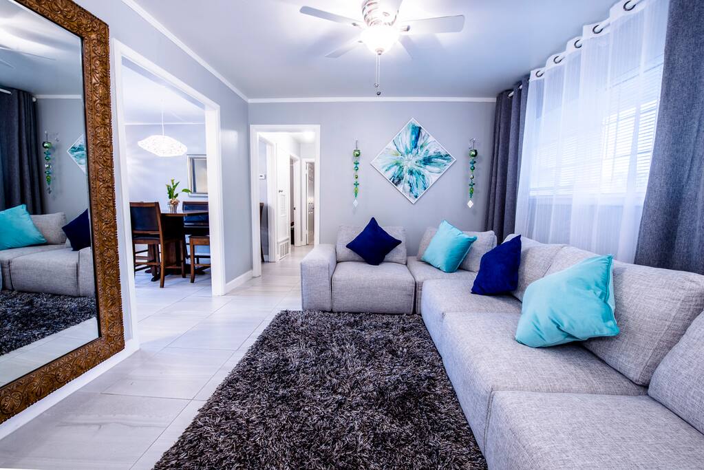 Living room with expandable sofa