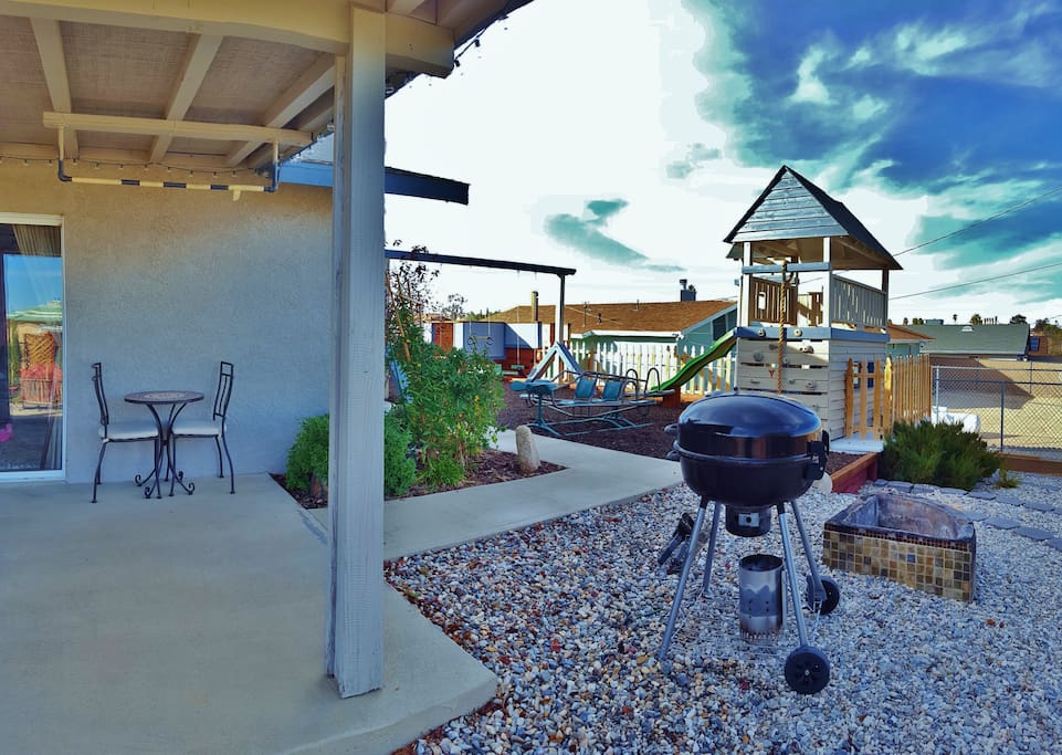 Bistro set, pull-up bar, BBQ, fire pit and kid's playground