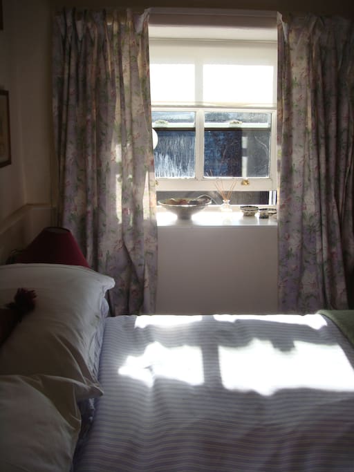 Sunny bedroom with lovely views across valley