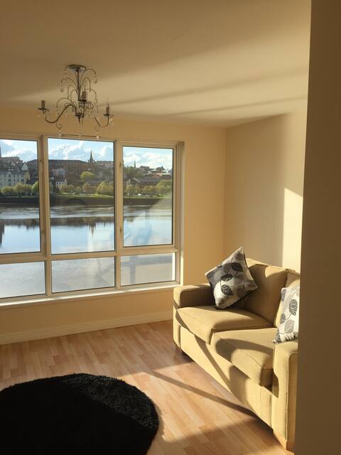 Riverside apartment city views