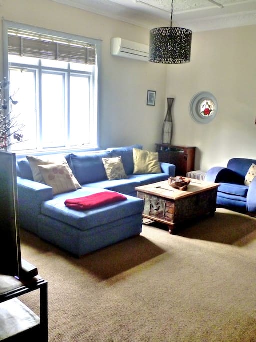Lounge room with very comfortable lounge and new carpet