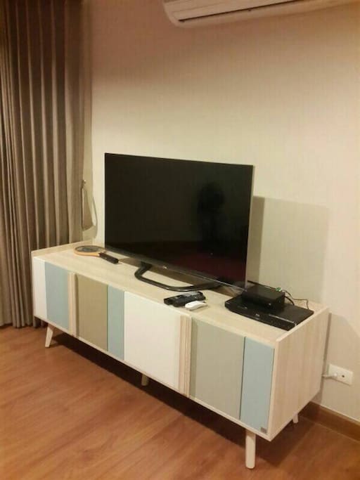 47" inch smart TV with local cable and internet/wifi.