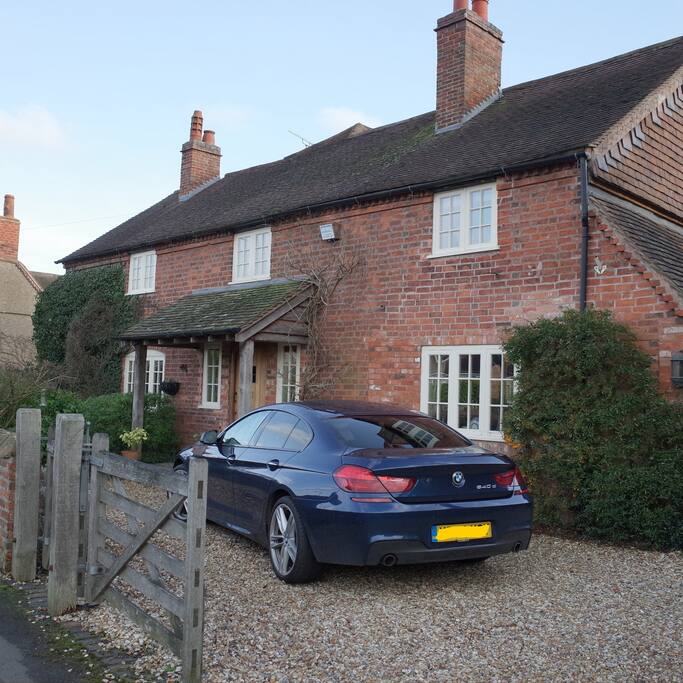 Look for this house, and park down the side, access to the cottage is through a side entrance
