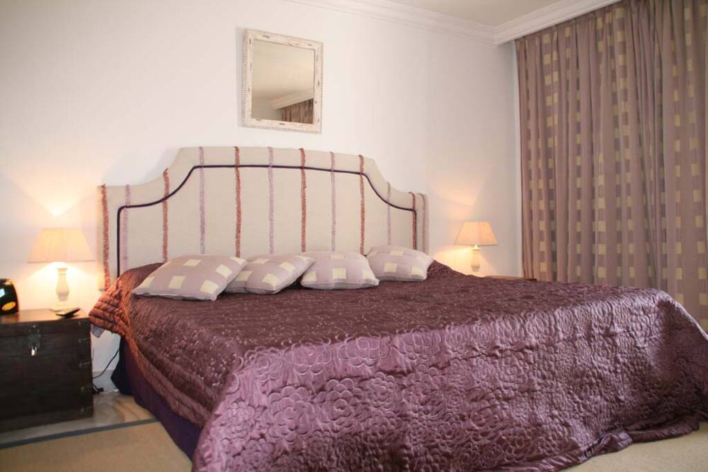 Master bedroom with king size bed