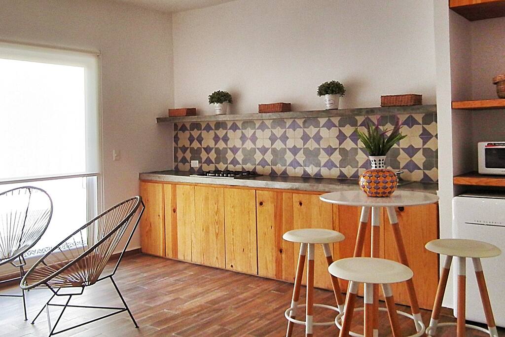 All the studios have a full equiped kitchen, tv area with netflix account, free wifi, dinning area, double bed, balcony, dressing room, and bathroom.