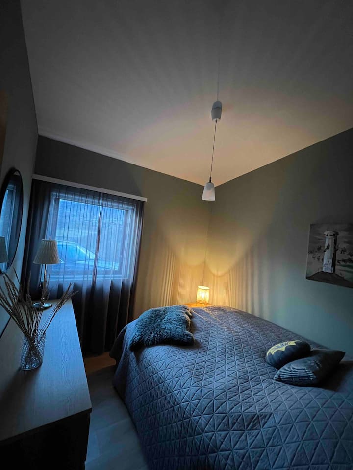 This cozy extra bedroom is furnished with a comfortable queen size bed and a spacious dresser, making it perfect for your everyday use during your rental stay