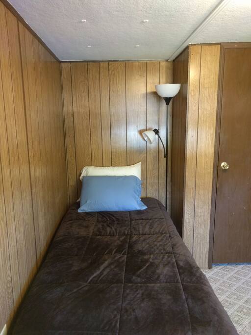 Twin bed in the second bedroom.