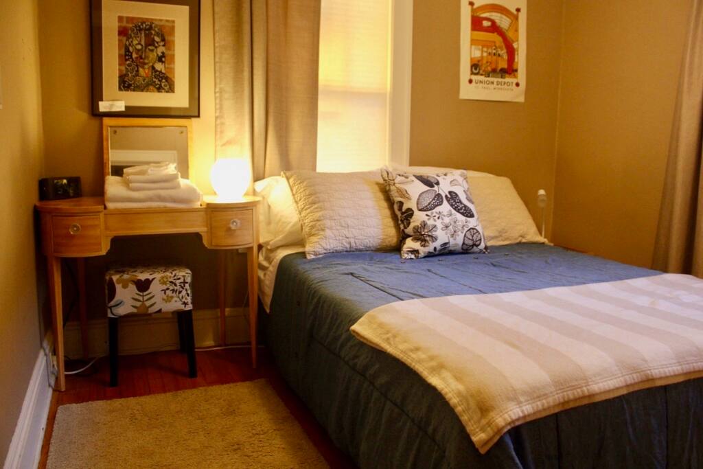 The guest room sleeps 2 in this full size bed with memory foam mattress topper. Extra blankets are provided for your comfort. The bedside table stores oft-forgotten amenities and books.
