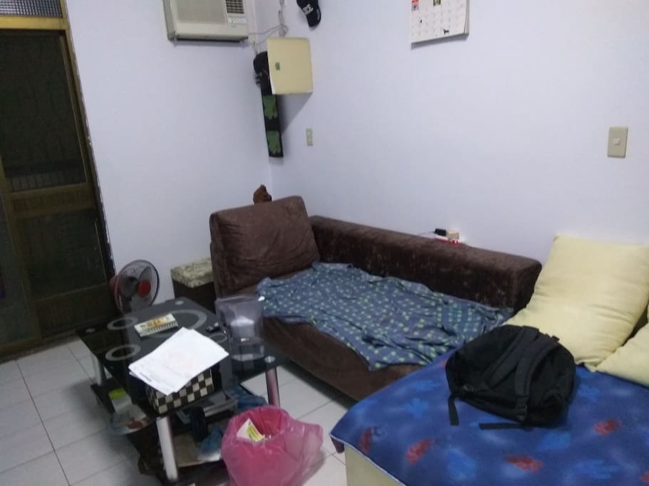 Living room. Can sleep on sofa.