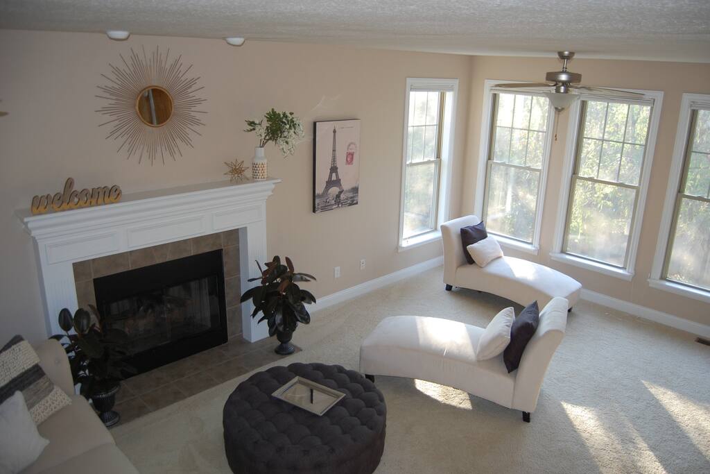 Large living room with an abundance of natural light!