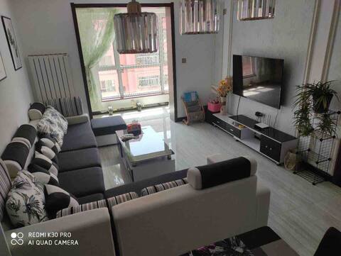 Simple and stylish 2 bedroom Heng Ai B&B near the subway exit of Qili Hexi Station, Lanzhou City