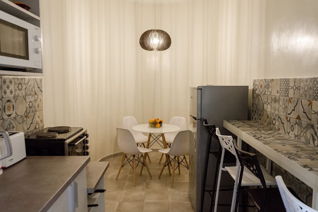 Fully equipped kitchen with dining room.