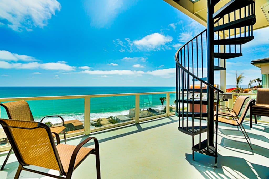 Enjoy the view or BBQ on the second floor deck or simply take the stairs up to the roof top deck for even more unobstructed view