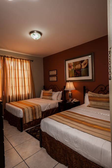 Superior Room with 2 double beds. Sleeps up to 4 persons.