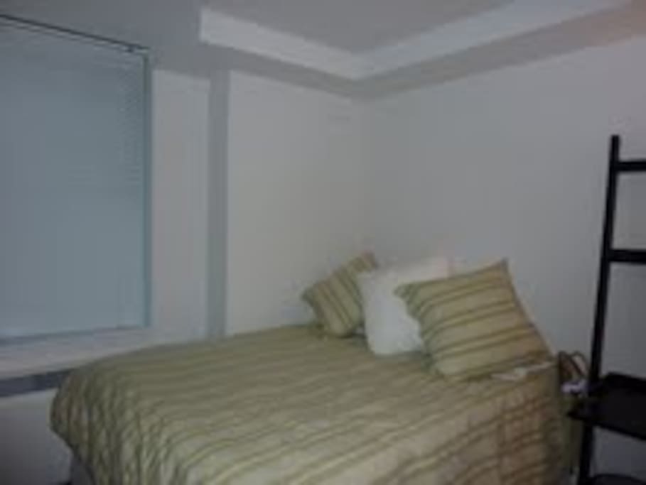 Private bedroom with queen-sized bed