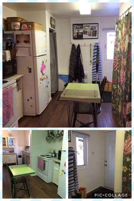 This room is the entrance, but doubles as a laundry room (behind the curtain) and the kitchen flows into it.