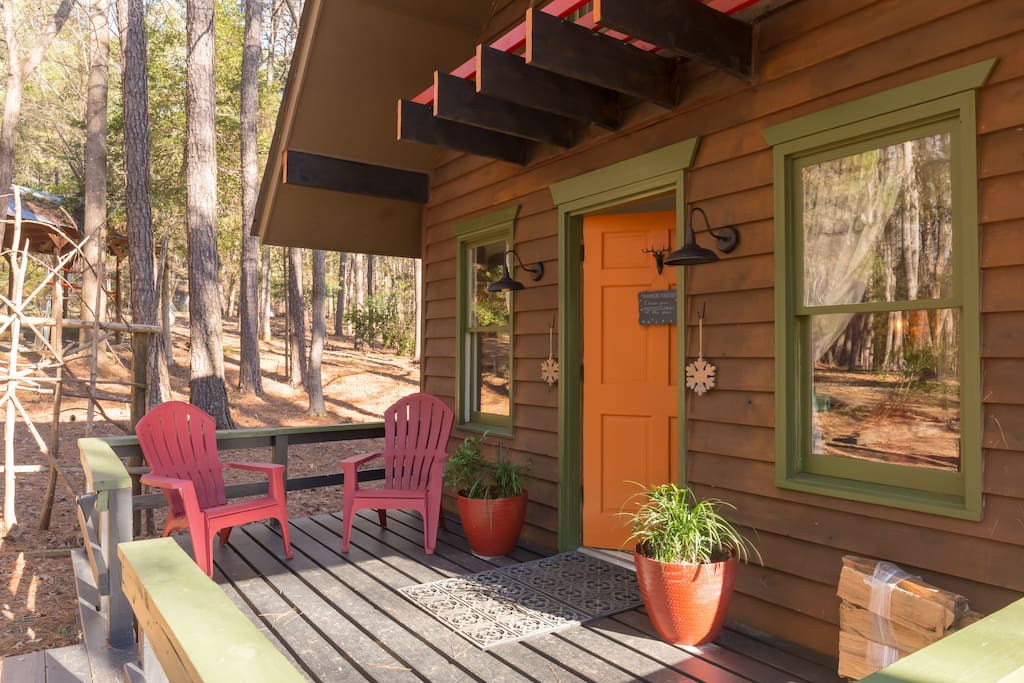 Sip your coffee on your front deck under towering trees