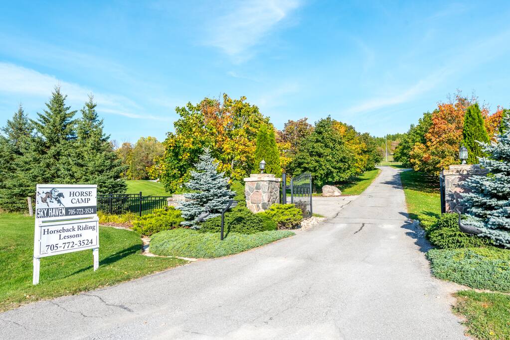 Your suite is off of the driveway to the left that leads up the hill behind the building.