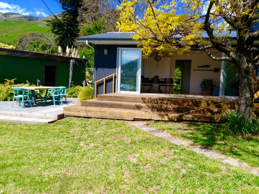 Paved outdoor space, deck.