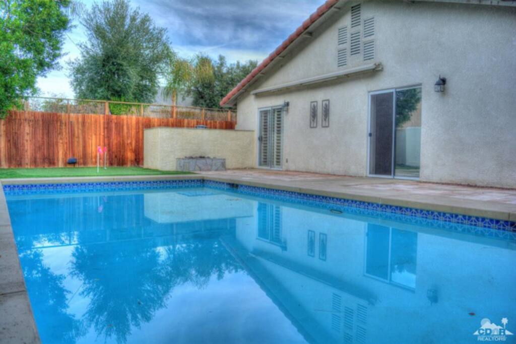 Backyard Pool with Bbq area and fireplace