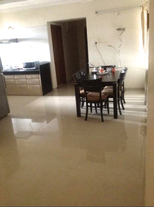 Dining and kitchen with utility balcony