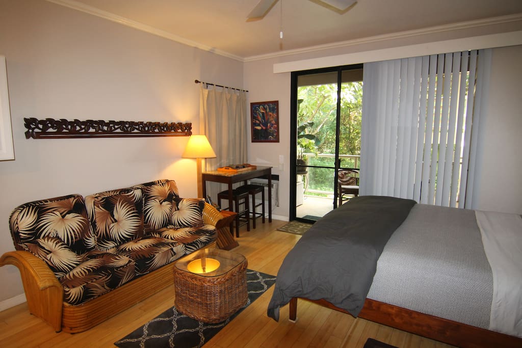 Comfy vintage Hawai'i style sofa (does not fold out); tropical modern furnishings.