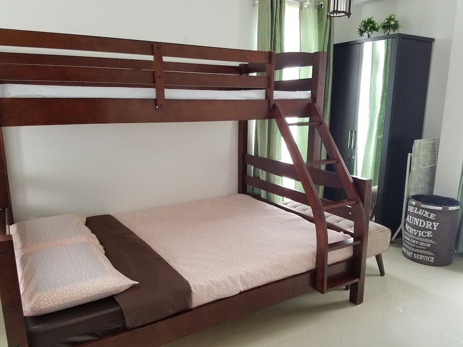 A single sofa bed can be made available for your extra child. It fits well under the full-size bed...