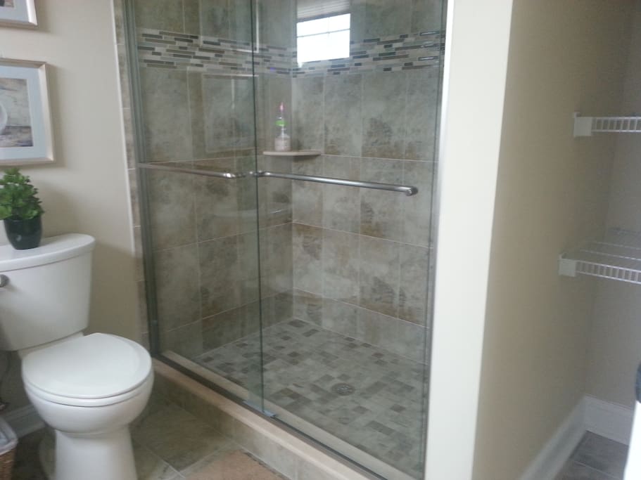 Master Bathroom with walk-in shower and linen area.