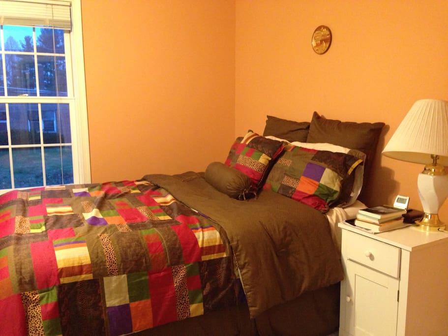 Comfortable master bedroom with private bathroom.