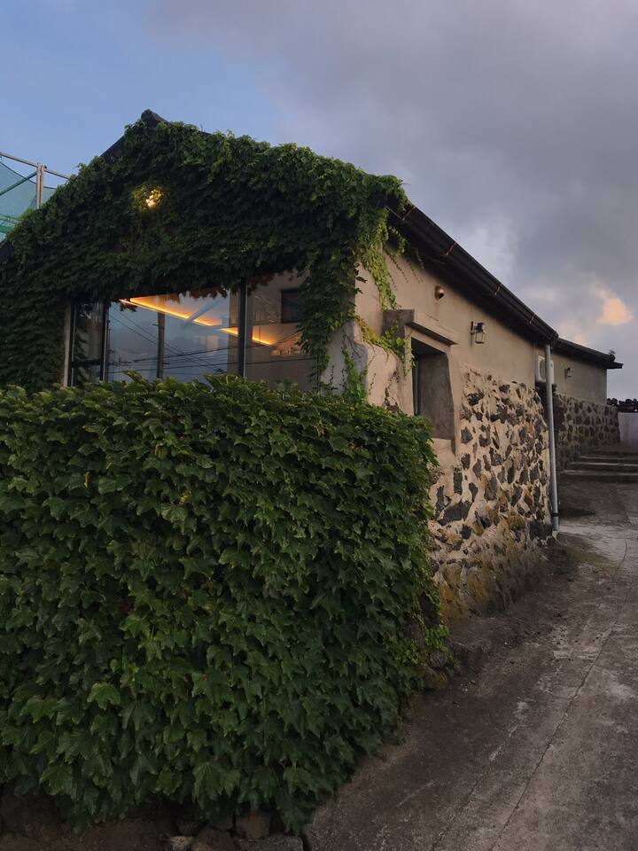 Stone House Embracing the jeju seas Cottages for Rent in Jejusi