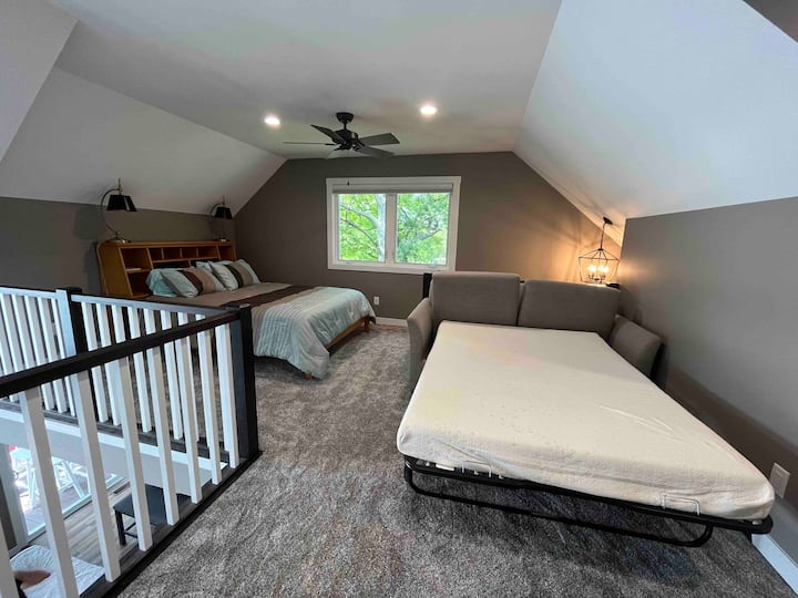 open loft bed area- queen bed and sofa pull out bed