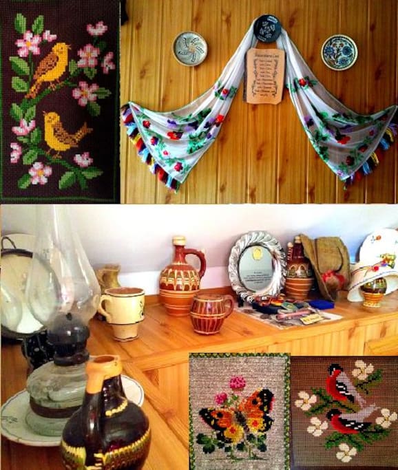 Traditional ornaments and pottery on display in the room.